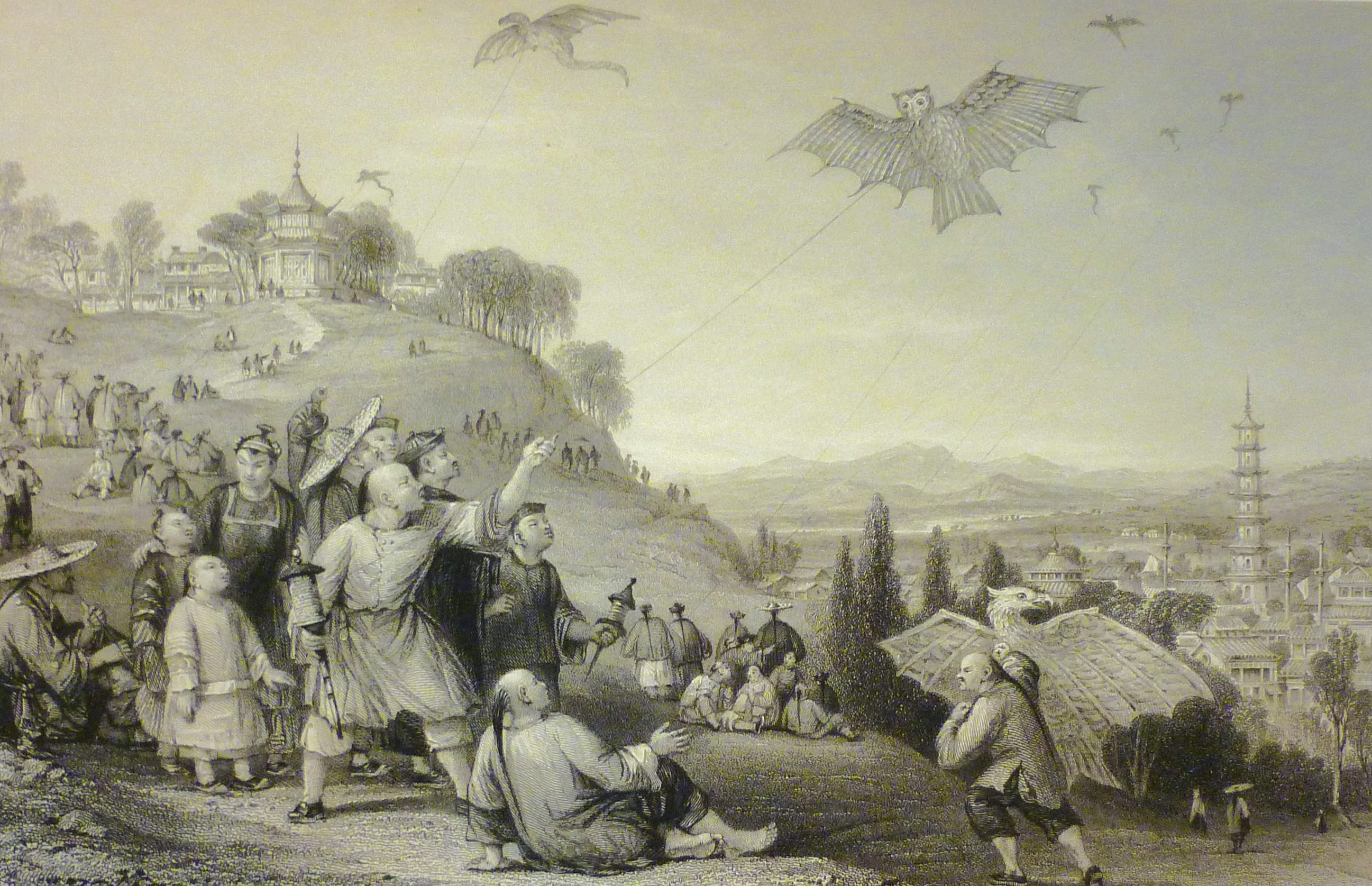 Kite-flying at Hae Kwan. Image reproduced from Allom, T. (1843). China, in a series of views, displaying the scenery, architecture, and social habits of that ancient empire. London: Fisher, Son & Co.